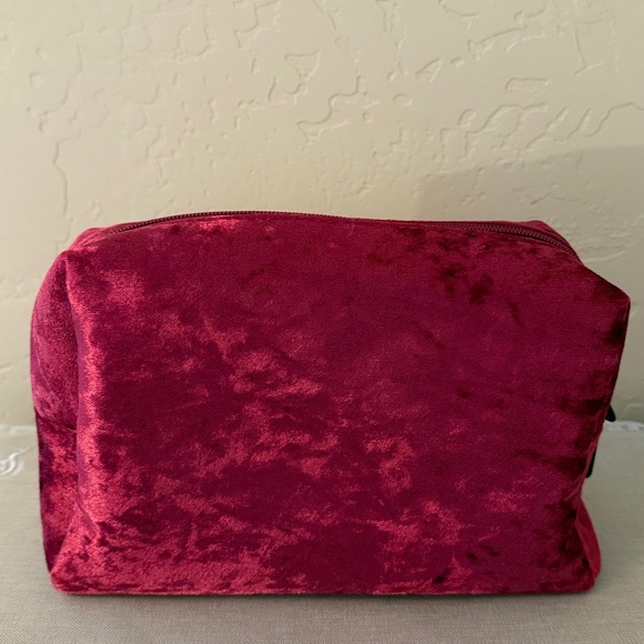 Beautiful cranberry red crushed velvet bag with hair, skin and make-up products - Picture 5 of 7